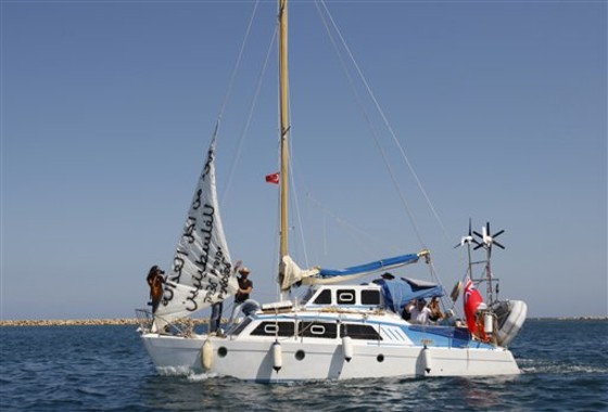 Naval forces took control of a Gaza-bound boat with 9 Jewish activists aboard, shown here as it sets sail from Famagusta harbour in the Turkish-occupied north of ethnically divided Cyprus on Sunday. The trip came nearly four months after Israeli commandos boarded a flotilla of Gaza-bound ships, killing nine activists. 
